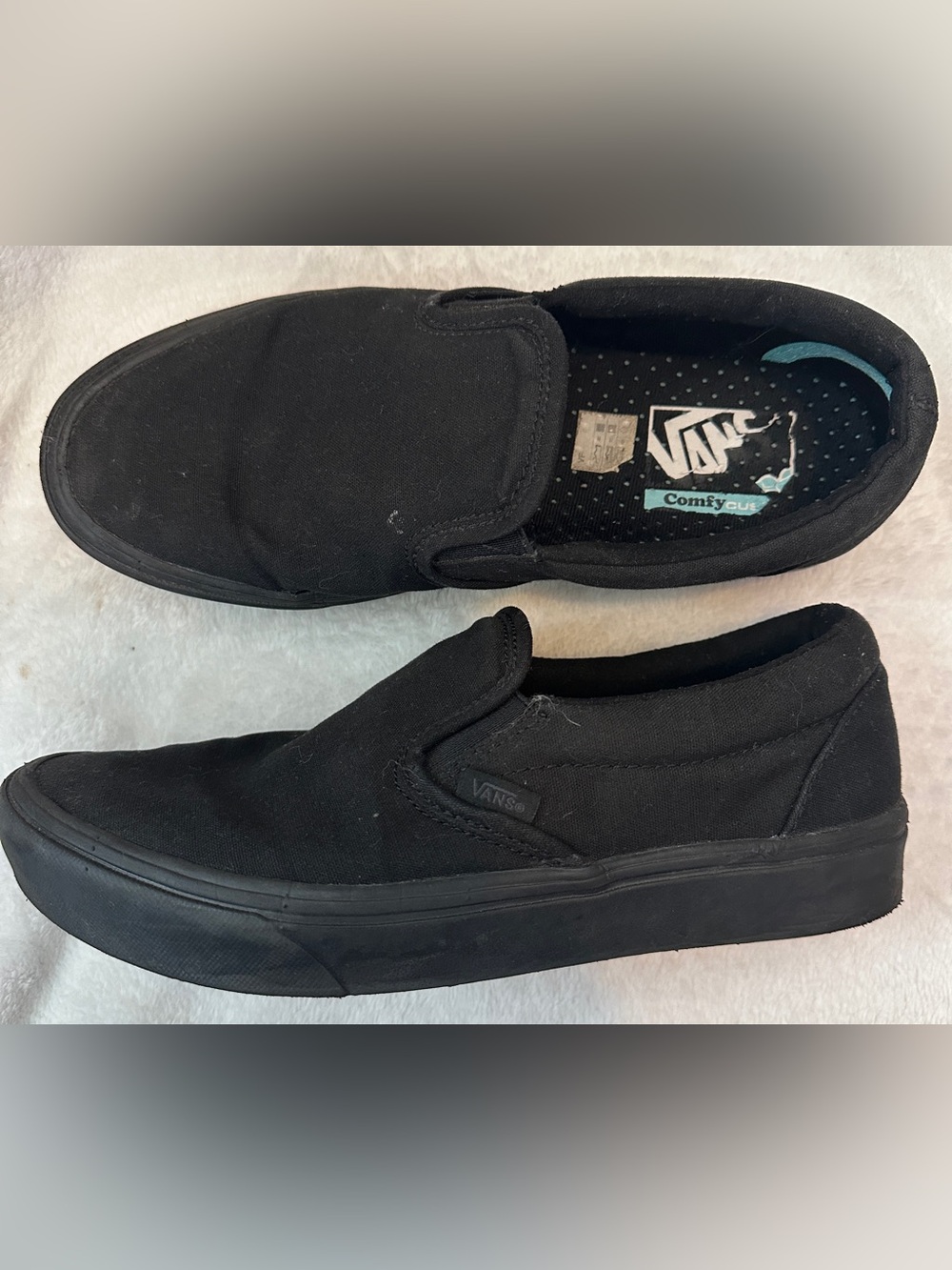Vans unisex black on black classic slip-ons M7/W8.5